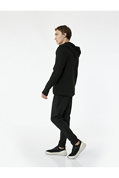 Koton Sportovní tepláky Jogger s kapsami na zavazování v pase a detaily prošívání