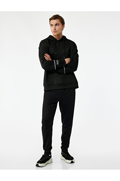 Koton Спортни панталони с джобове с цип от плат Scuba