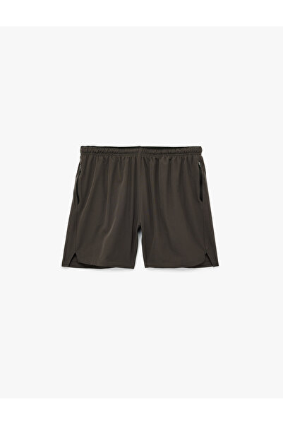 Koton Fermuarlı Cepli Paraşüt Kumaş Yırtmaç Detaylı Oversize Beli Lastikli Spor Şort