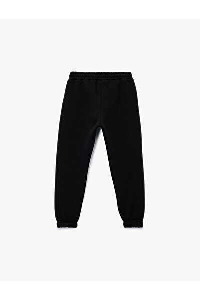 Koton Βασικό παντελόνι Jogger με λεπτομέρεια τσέπης με αποκάλυψη