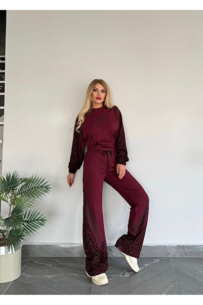 Bella Belluci طقم علوي وسفلي من قماش المودال المرن بالكامل مع خصر عالٍ وسحاب جانبي ونقشة الفهد