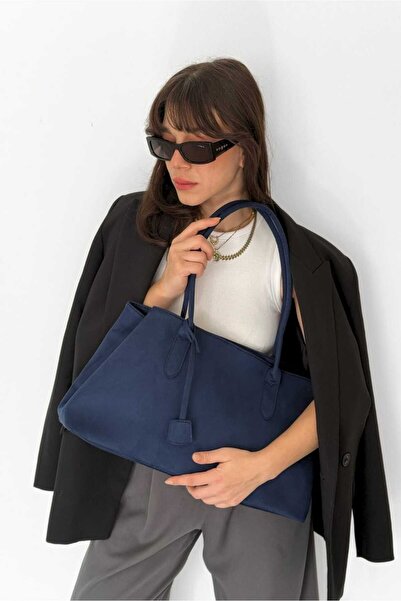 Yuka Atelier حقيبة يد ليون من الجلد السويدي