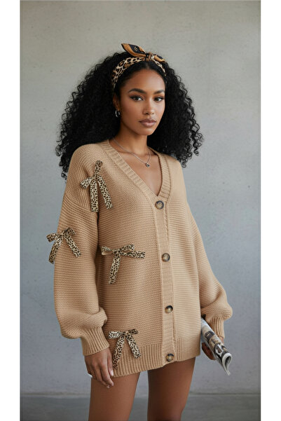 NİLZA كارديجان نسائي طويل كبير الحجم بأزرار وتفاصيل فيونكة بنقشة الفهد