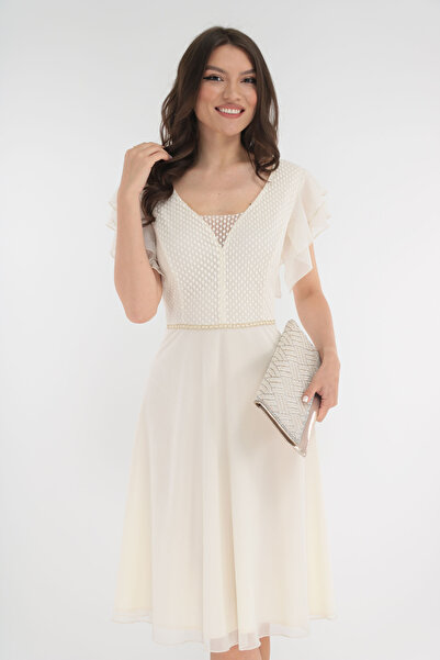 Vanessa Line RO Ivory tulle occasion dress with ruffles on the shoulders