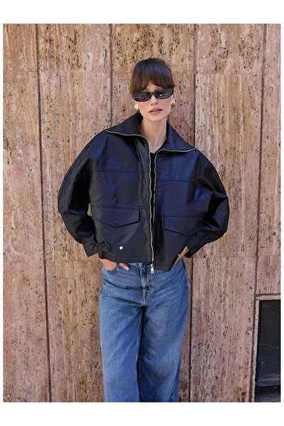 Coral سترة بأكمام مطاطية 9590 باللون الأسود