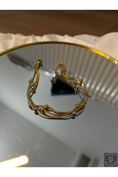 uyguntakıaksesuar سوار ذهبي اللون بسلسلة متعددة وتفاصيل كروية – تصميم أنيق وراقٍ