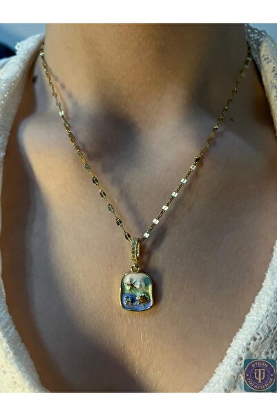 uyguntakıaksesuar قلادة زرقاء مستوحاة من البحر – تصميم ذهبي اللون مع تفاصيل ا...