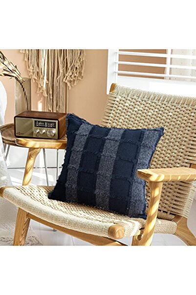 Generic Square pillow with an interlocking check design.