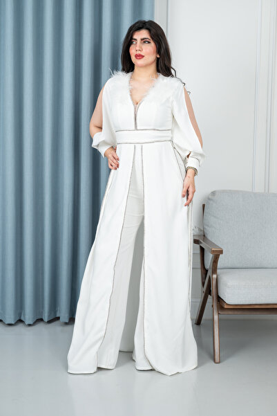 Lara Luxurious white jumpsuit with feather detailing on the shoulders