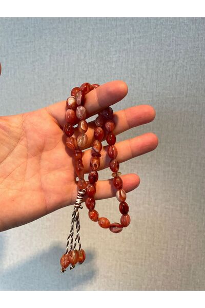 Mucemi System Tassel 8*12 Mm. Almond Cut Red Color Crimped Amber Prayer Beads