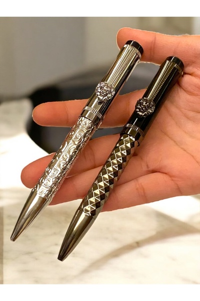 NEW STYLE A set of elegant and modern ballpoint pens with lion-shaped decorations and clips for those who love distinction.