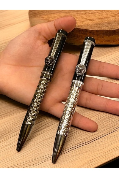 NEW STYLE A set of elegant and modern ballpoint pens with lion-shaped decorations and clips for those who love distinction.
