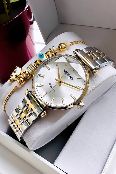 Tom Jones ساعة يد نسائية أصلية 3 Atm مقاومة للماء باللون الذهبي وسوار فولاذي ...