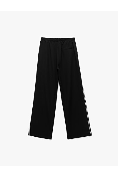 Koton Yanları Şerit Detaylı Cepli Düz Bol Paça Eşofman Pantolon