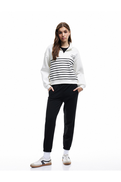 Koton Ανοιχτόχρωμο ελαστικό μέσης με λεπτομέρεια τσέπης Άνετο Jogger Sweatpants