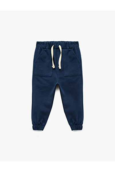 Koton Βασικό παντελόνι αθλητικού τύπου από βαμβάκι με λεπτομέρεια τσέπης με κορδόνια στη μέση