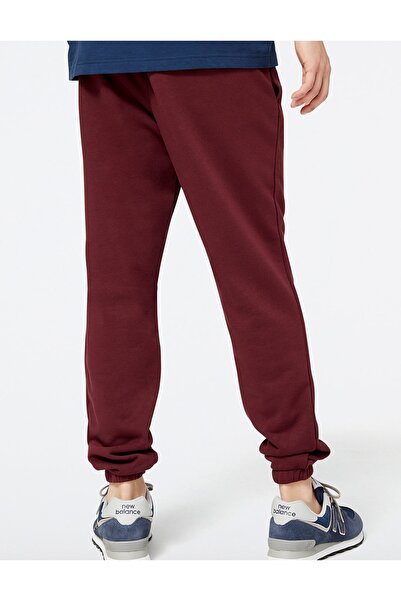 New Balance Pantaloni de trening pentru bărbați MP23912-NBY