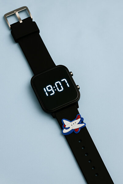 sezerekspres ساعة يد للأطفال من روديوم مع حزام سيليكون ورمز تعبيري للطائرة، س...