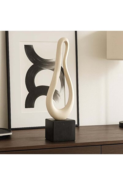 Vi Markets مجسم ديكوري عصري على قاعدة سوداء أنيقة.