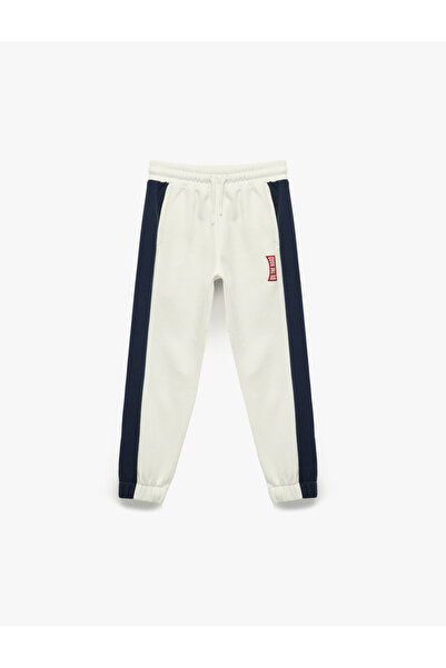 Koton Дънки с трилентов шарк мотив, джобове и еластична талия в контрастен цвят