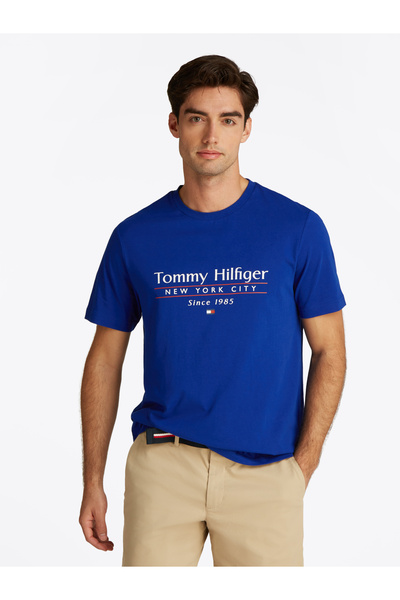 Tommy Hilfiger تي شيرت رجالي أزرق بكعب عريض وشعار من مجموعة 1985