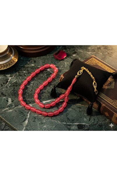 Anemore Collection سبحة زجاجية على شكل طائرة باللون الوردي