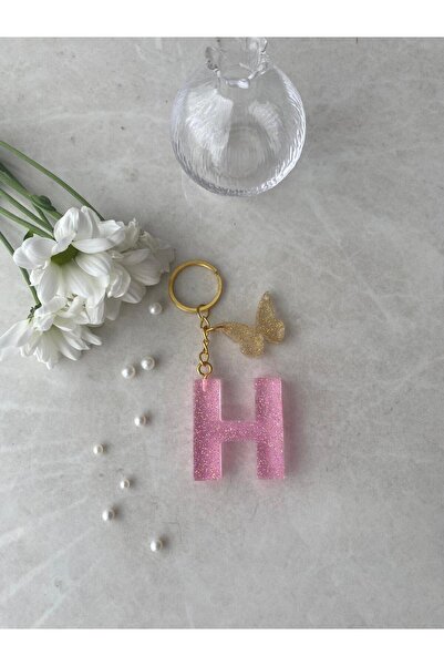 Bellinzona H буква розов блестящ ключодържател и талисман [с опция за помпон]