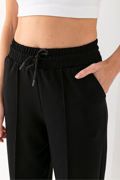 AsHK Kadın Siyah Yüksek Bel Cepli Modal Kumaş Önü Nervürlü Balon Kalıp Pantolon