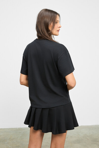 GRIMELANGE Zanitha Women's Soft and Flexible Fabric Pleated Zippered Mini Black Skirt