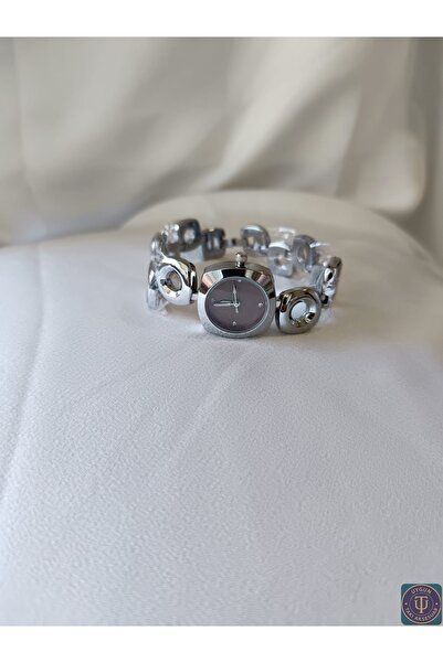 uyguntakıaksesuar ساعة يد نسائية فضية اللون – تصميم عصري وأنيق