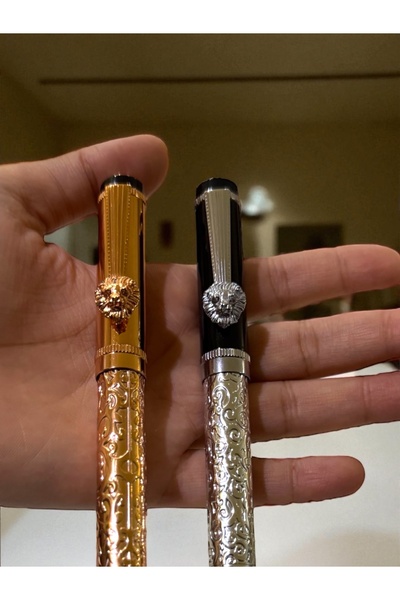 NEW STYLE A set of elegant and modern ballpoint pens with lion-shaped decorations and clips for those who love distinction.