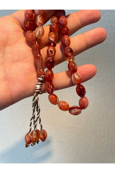 Mucemi System Tassel 8*12 Mm. Almond Cut Red Color Crimped Amber Prayer Beads
