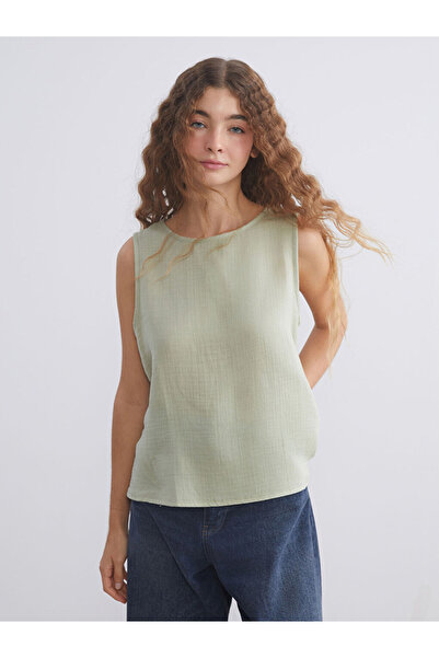 LC Waikiki Create Your Style from Uzg Store |   Crew Neck Textured Muslin Blouse