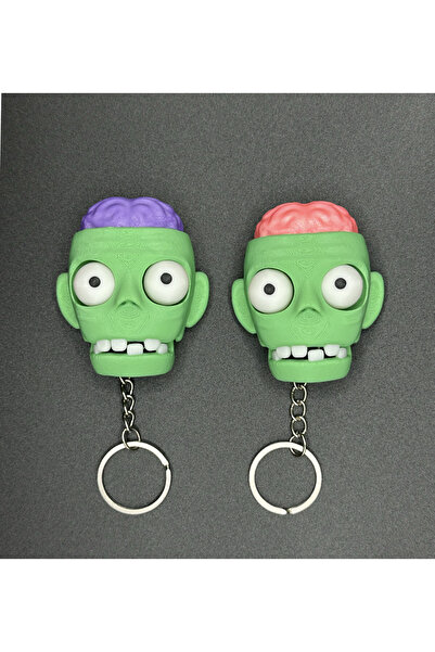 Snickerdoodles سلسلة مفاتيح زومبي متحركة 2 قطعة - الهالوين
