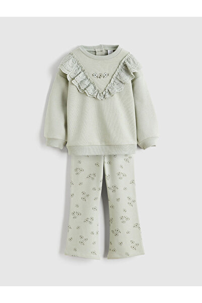 LC Waikiki بلوزة وبنطلون ضيق للفتيات الصغيرات من الموسم الجديد مزين بالكشكشة والزهور