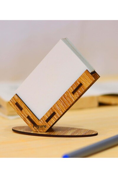 Figür Reklam Ajansı حامل بطاقة العمل على الطاولة