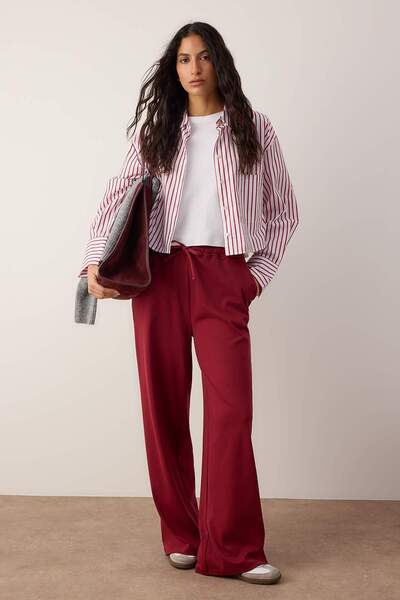 Trendyol Collection Burgundy Seasonal Wide Leg/Flared Leg Detailed Stretch Knitted Sweatpants Twoaw26Ea00005