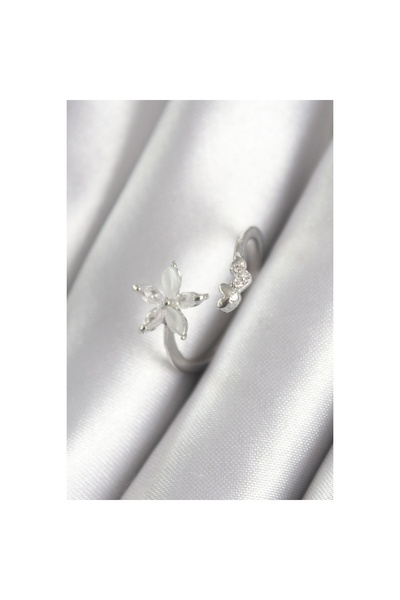 HERŞEYBURDAMODA خاتم نسائي من النحاس الفضي اللون بحجر الزركون على شكل زهرة وت...