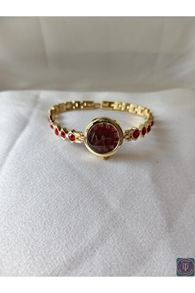 uyguntakıaksesuar ساعة يد نسائية ذهبية اللون مع أحجار حمراء – تصميم أنيق على ...