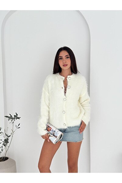 Jeevee سترة تريكو بياقة دائرية ونسيج مخملي مع أزرار كبيرة