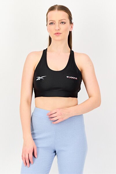 Reebok حمالة صدر رياضية نسائية x Misbhv غير مبطنة بشعار العلامة التجارية، لون...