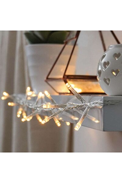 Flippy Battery-operated linear Christmas lights, 2 light modes, transparent wire, 1 m, 10 LEDs, warm white