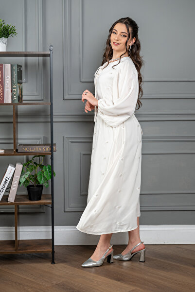 Ron Discover elegance and delicacy with our new midi dress