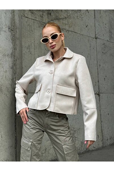 Le Savu Jachetă de culoare crem cu detaliu de nasturi și buzunare din țesătură de piele de căprioară Sevunera