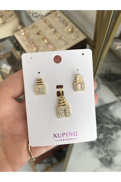 the ASEL İNCİ طقم أقراط XUPING مكون من 3 قطع بتفاصيل حجرية (لا يسود)