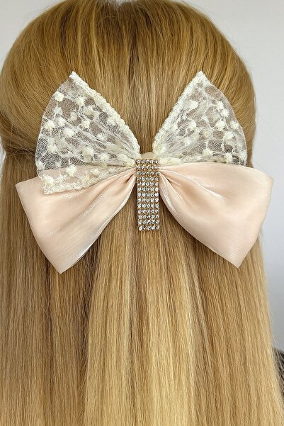 TAKIŞTIR Αυτόματη πόρπη με κρεμ χρώμα και λεπτομέρεια από πέτρα σε σχήμα κορδέλας