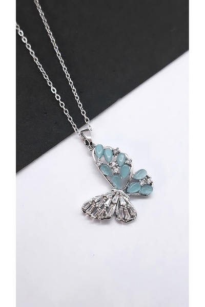 Serenity قلادة فولاذية على شكل فراشة مرصعة بحجر الزركون الأبيض الفيروزي