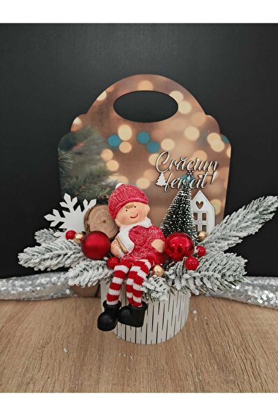 DLC Christmas arrangement in a box with a little girl