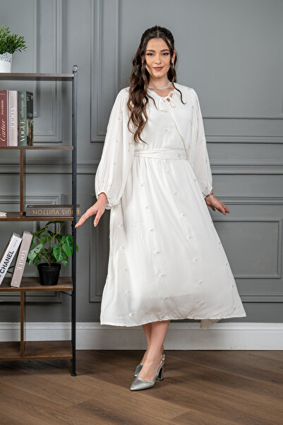 Ron Discover elegance and delicacy with our new midi dress