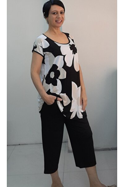 Mertcan Butik All Black Floral Print Low-Sleeve Cotton Viscose Suit with Six Black Tops and Six Pockets on the Top.